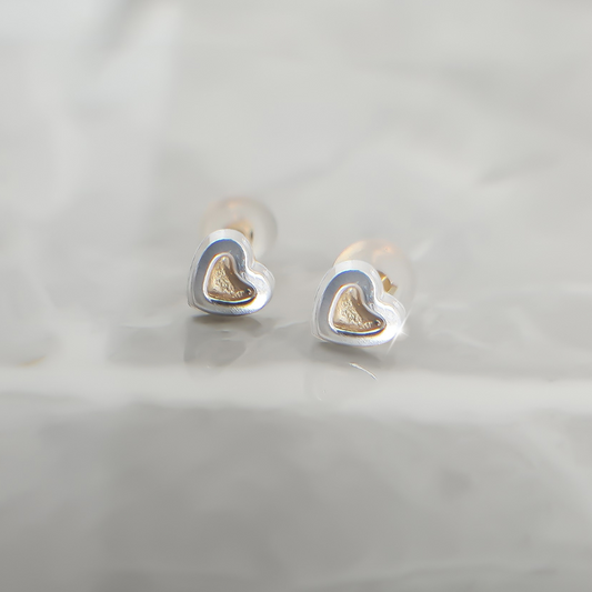 Heart with a Indent Yellow Gold Heart studs in 9ct White Gold