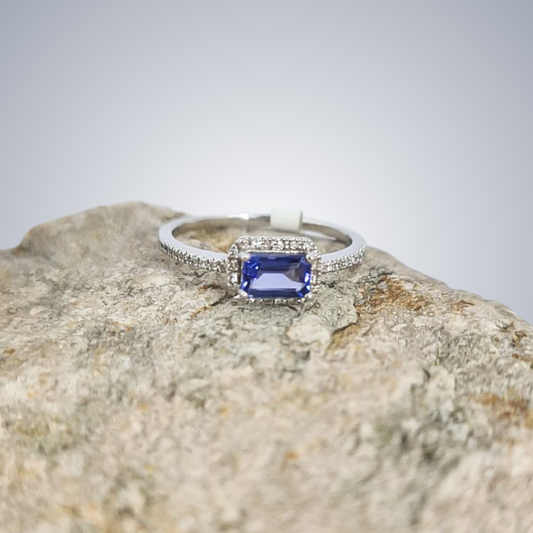 0.50ct Tanzanite Emerald Cut with Diamond Halo Ring in 9ct White Gold