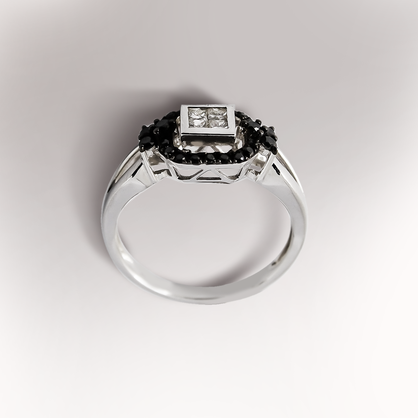 0.19ct Black Diamond with 0.16ct Princess Diamond Ring in 9ct White Gold