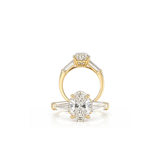 1.06ct Oval Lab-Grown Diamond Ring with Emerald Side Stones in 9ct Yellow Gold