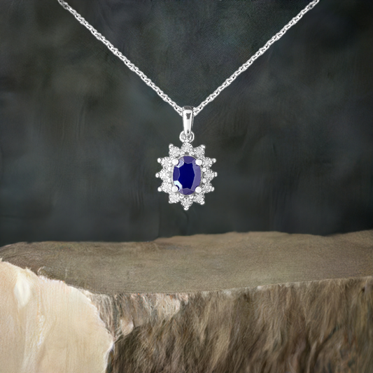 0.75ct Sapphire and Diamond Halo Ring in 9ct White Gold Pendant