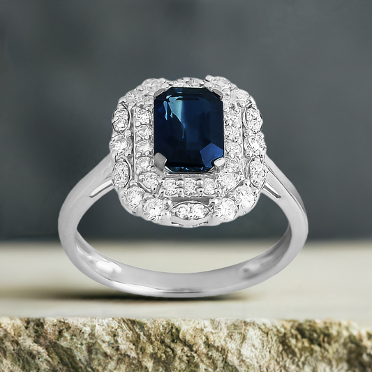 1.10ct Emerald cut Sapphire and Double Diamond Halo Ring in 9ct White Gold