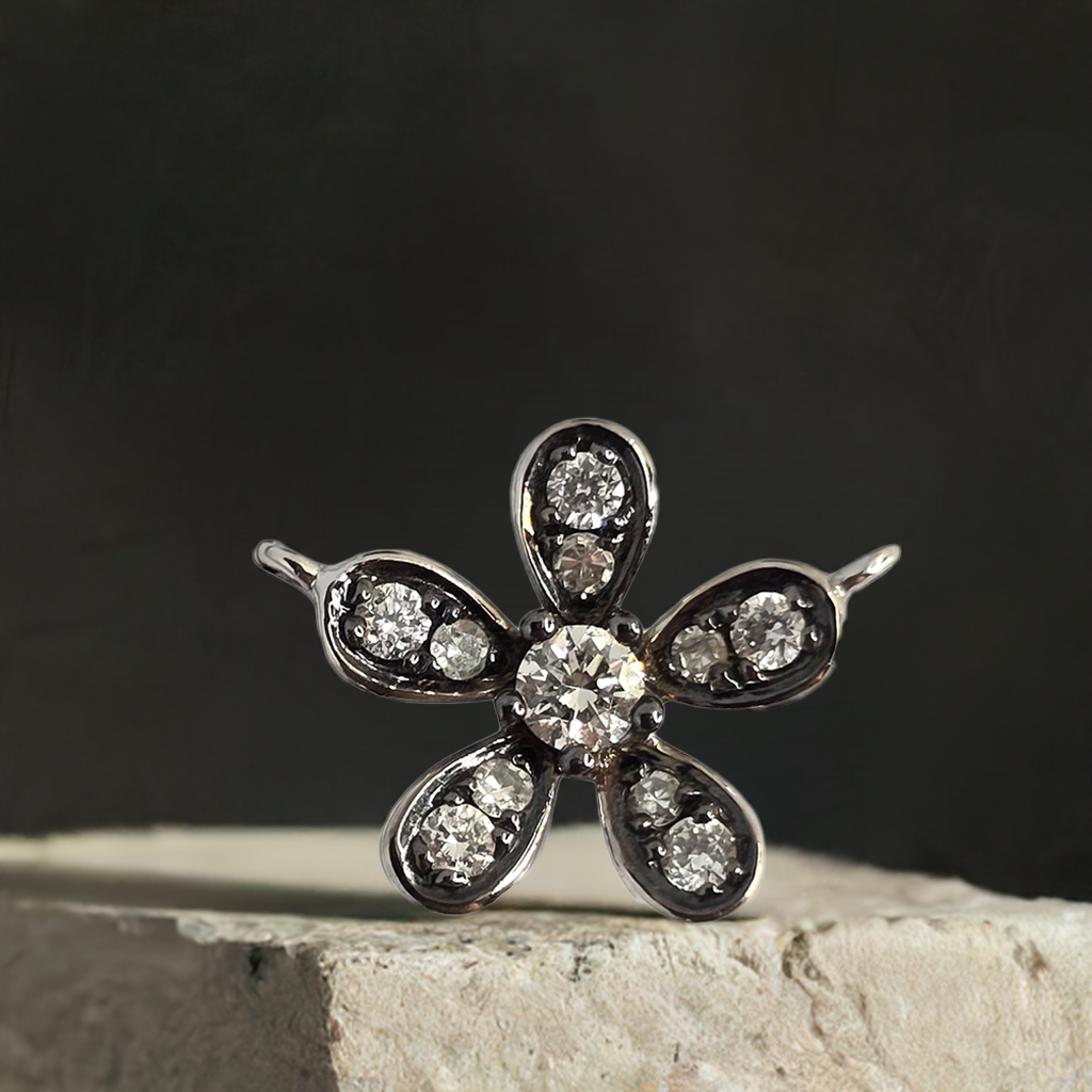 0.15ct Diamond Flower Design in 9ct White Gold on Chain