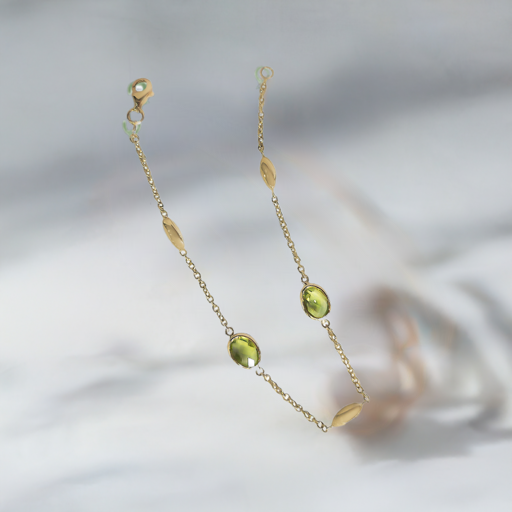 Oval Peridot drop Bracelet in 9ct Yellow Gold