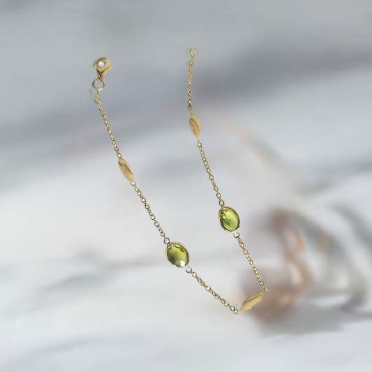 Oval Peridot drop Bracelet in 9ct Yellow Gold