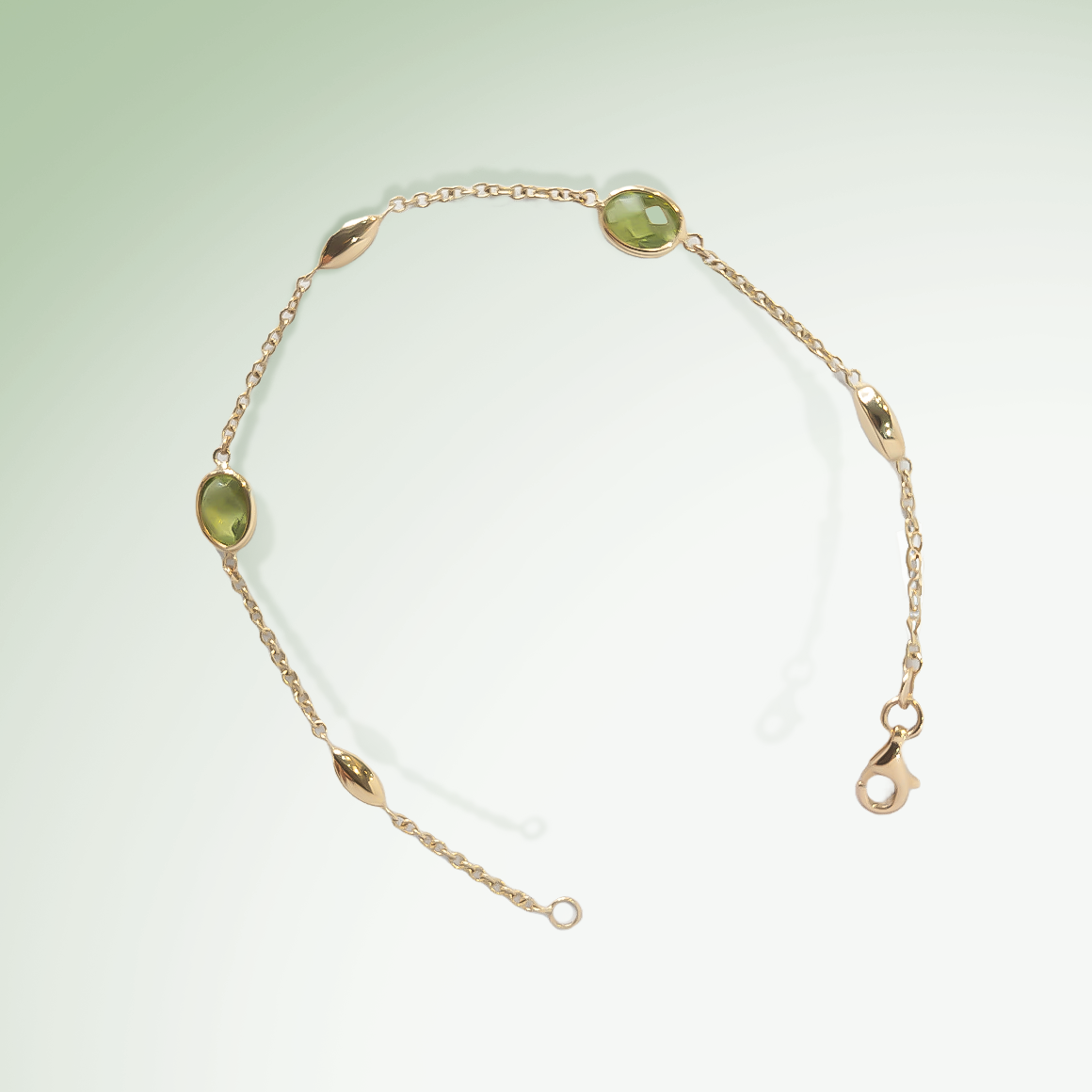 Oval Peridot drop Bracelet in 9ct Yellow Gold