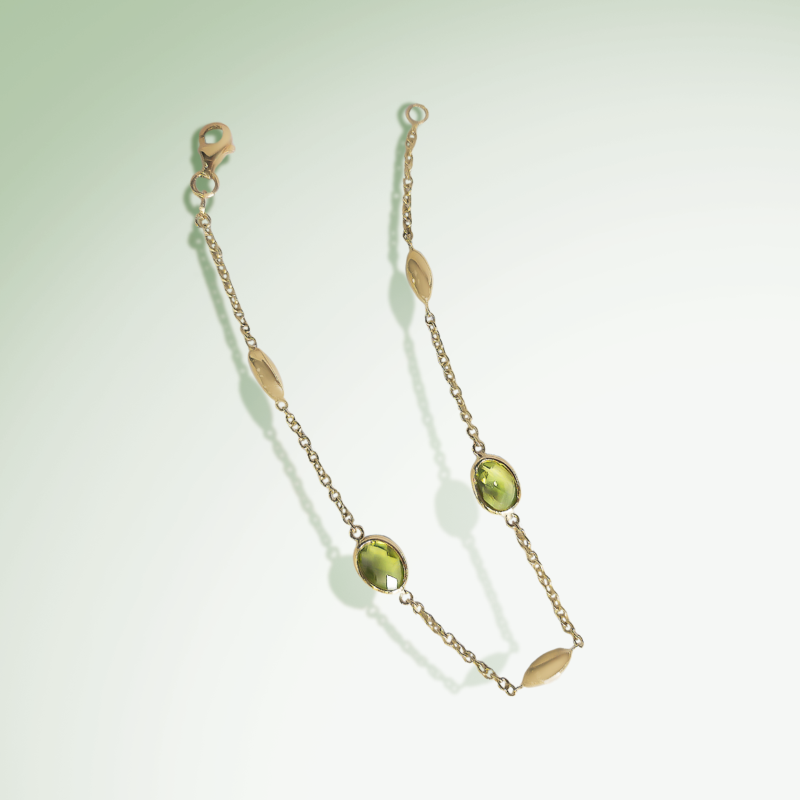 Oval Peridot drop Bracelet in 9ct Yellow Gold