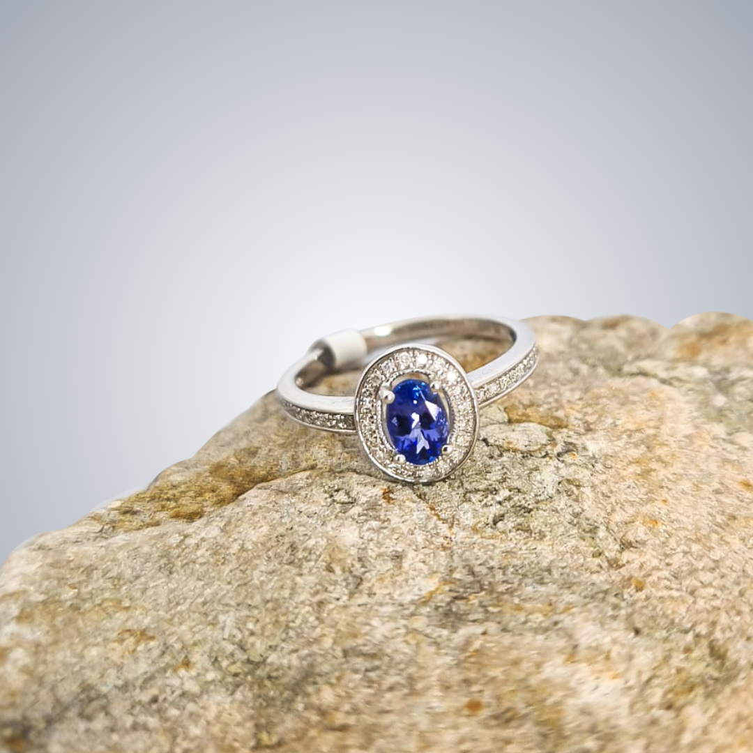0.60ct Tanzanite Oval Cut with Diamond Halo Ring in 9ct White Gold