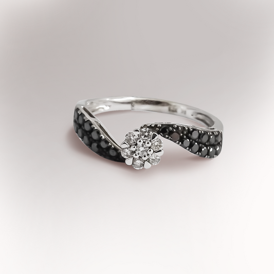0.32ct Black Diamonds decorating a 0.16ct Diamond Cluster Twist Ring in 9ct White Gold