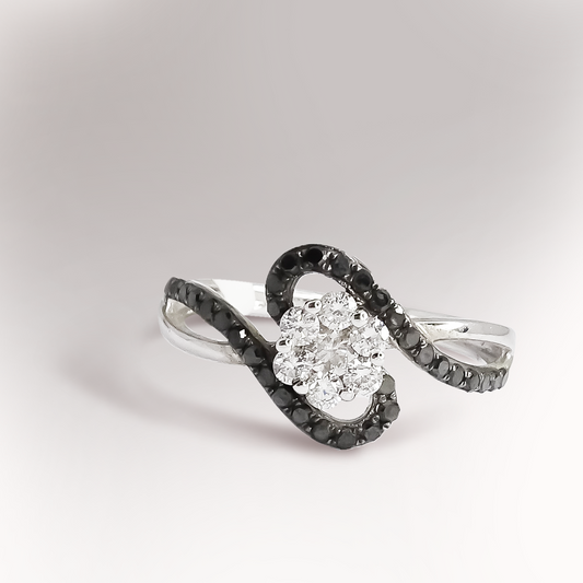 0.25ct Black Diamonds Swirl decorating a 0.07ct Diamond Cluster Twist Ring in 9ct White Gold