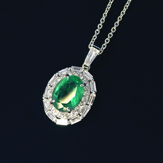 1.09ct Emerald and Diamond Oval Royal Design Pendant in 9ct White Gold