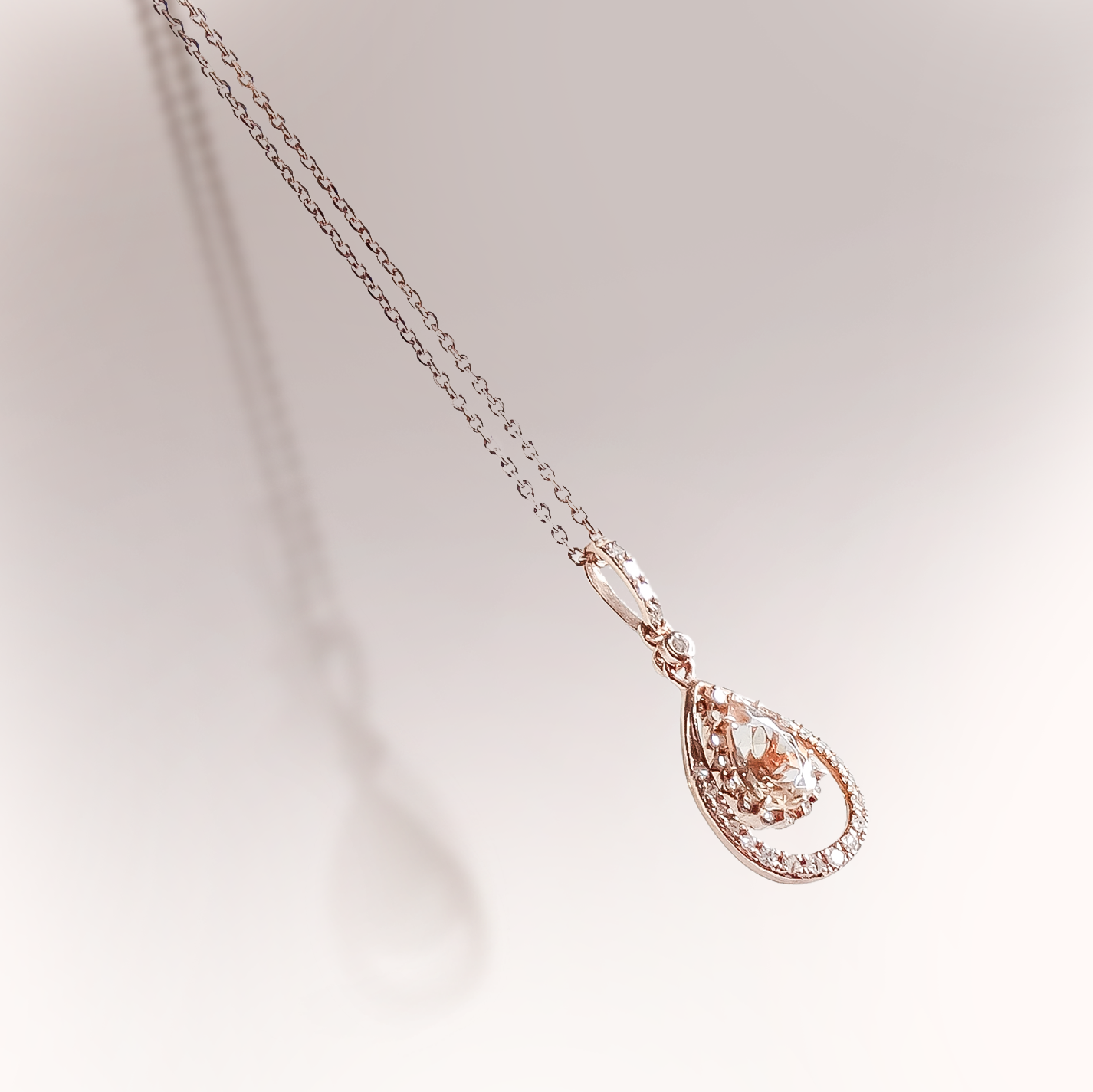 0.50ct Morganite Tear Pendant with double Diamond hang Halo in 9ct Rose Gold on Chain