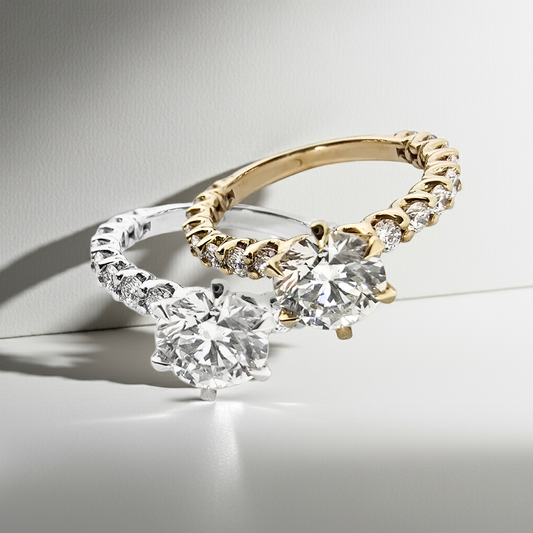 two gold rings with lab grown diamonds