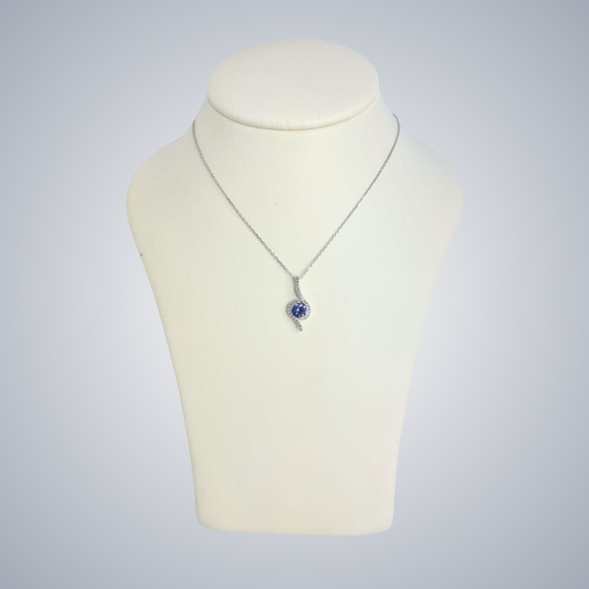 0.45ct Tanzanite and Diamond Swirl Cross Over Necklace in 9ct White Gold