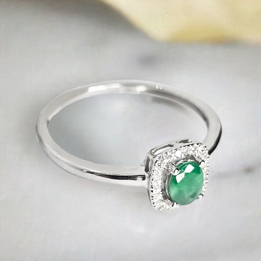 Oval Emerald and Diamond Halo Wedding Ring in 9ct White Gold