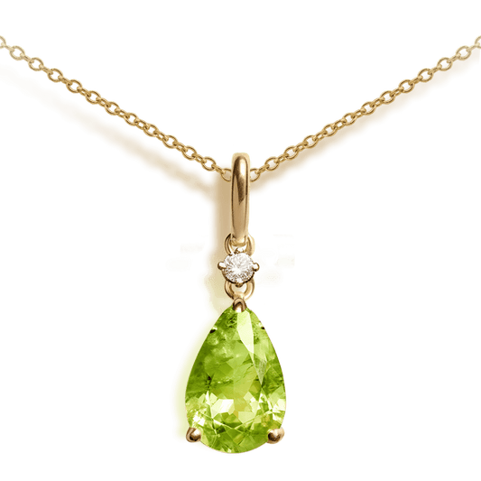 0.50ct Peridot and Diamond Pear Drop Pendant in 9ct Yellow Gold with a little diamond link.